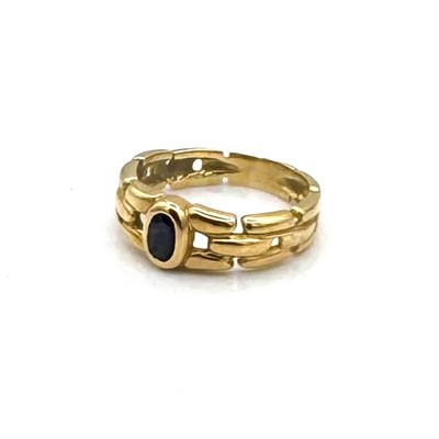 Lot 12 - 18K Gold and Sapphire Ring