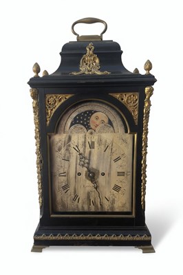 Lot 32 - A 20th-Century Anglo-French Style Ebonized and Gilt-Brass Table Clock with Moon Phase