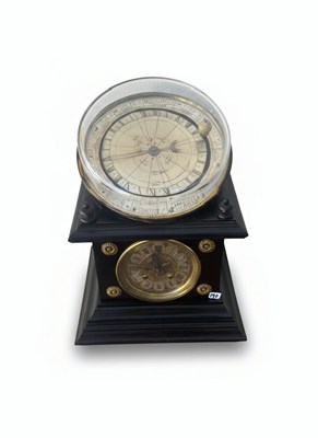 Lot 33 - A 20th-Century German Ebonized and Brass Compass Clock