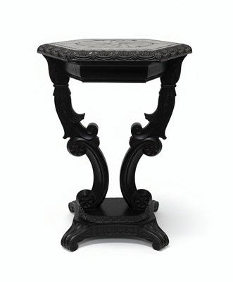 Lot 43 - A Victorian Ebonized and Carved Gueridon

19th Century