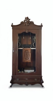 Lot 52 - A 20TH CENTURY REVIVAL ARMOIRE
Possibly German or English
Carved dark wood, possibly mahogany.