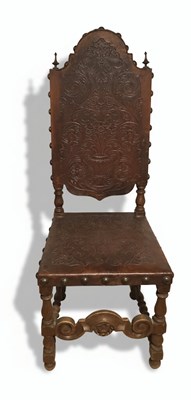 Lot 63 - A 19th-20th Century French Henry II-Style Carved Wood and Embossed Leather Chair