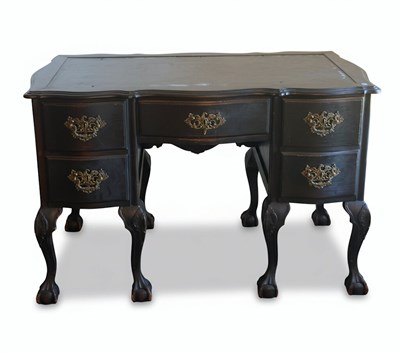 Lot 65 - A 20TH CENTURY PORTUGUESE ROCOCO REVIVAL DESK
Dark wood with brass hardware