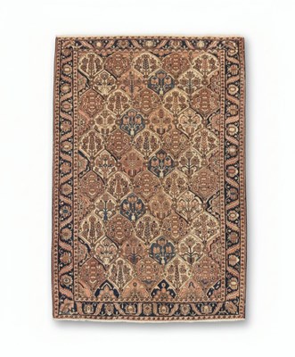 Lot 71 - A 20TH CENTURY ORIENTAL CARPET
Woven wool