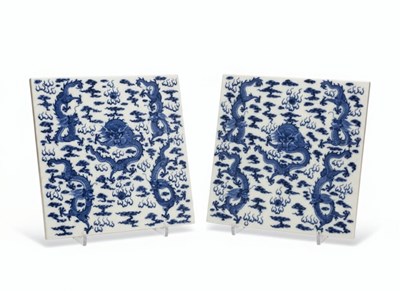 Lot 81 - A Pair of Underglaze Blue and White Porcelain Dragon Tiles
China, Qing Dynasty (1644-1912)