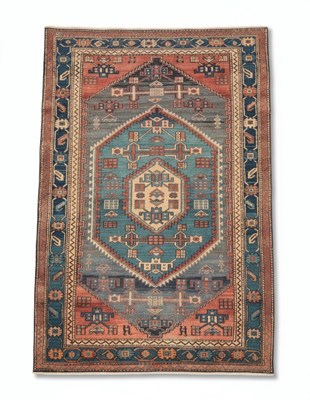 Lot 98 - A 20TH CENTURY CAUCASIAN OR TRIBAL STYLE WOOL CARPET
Woven wool.