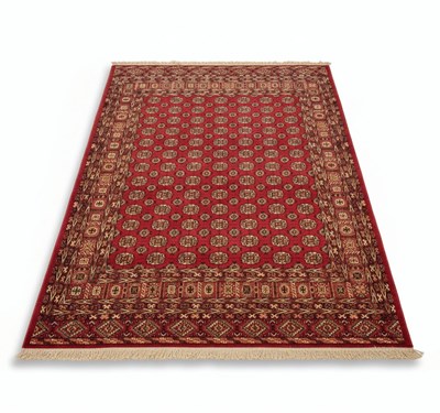 Lot 113 - A 20TH CENTURY TURKMEN OR BOKHARA STYLE WOOL CARPET
Woven wool.