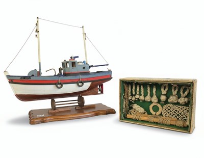 Lot 122 - A Model Fishing Trawler and a Nautical Knot Board