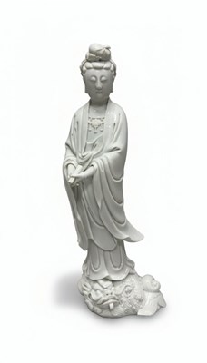 Lot 141 - A Blanc de Chine Porcelain Figure of Guanyin

China, Qing Dynasty (1644-1912)