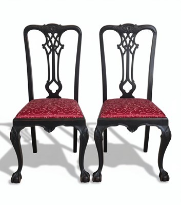 Lot 174 - A PAIR OF 20TH CENTURY ENGLISH ROCOCO REVIVAL CHAIRS
Carved dark wood with textile upholstery