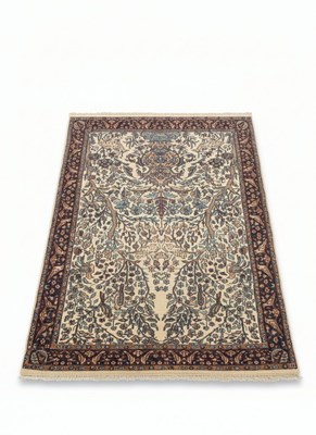 Lot 179 - A 20TH CENTURY PERSIAN OR 'TREE OF LIFE' STYLE WOOL CARPET
Hand-knotted wool.