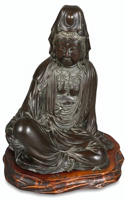 Lot 191 - A cast bronze figure of a seated Kannon
Meiji (1868-1912), early 20th century