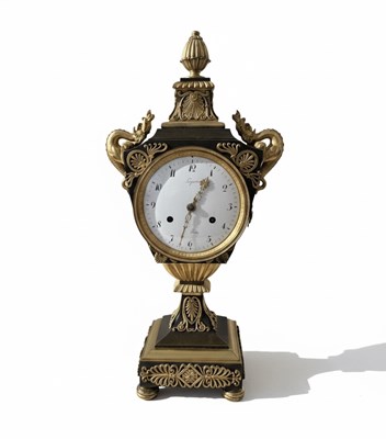 Lot 49 - A Louis XVI Gilt-Bronze and Patinated Bronze Mantel Clock