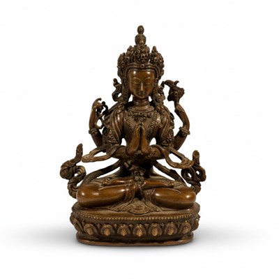 Lot 88 - A cast and Patinated Bronze Figure of a Four-Armed Bodhisattva