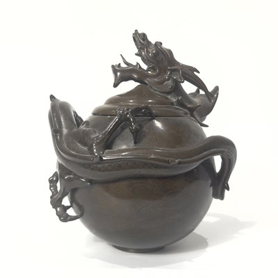 Lot 74 - A cast bronze silver inlaid dragon insence burner "Koro"