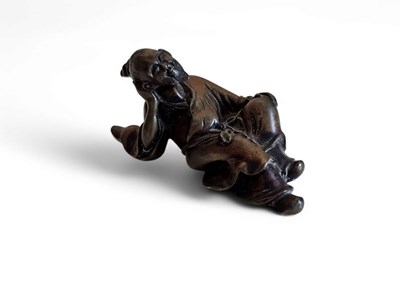 Lot 116 - A cast and patinated Bronze scroll weight