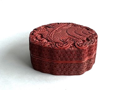Lot 160 - A small circular cinnabar lacquer box and cover