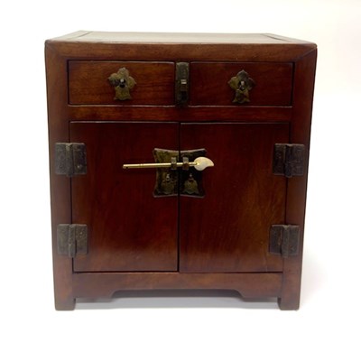 Lot 190 - A Small Chinese Hardwood Table Cabinet (Guì)