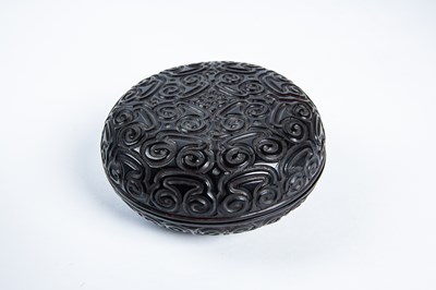 Lot 111 - A Fine Chinese Carved Black Lacquer (Tixi) Circular Box (He)