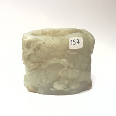 Lot 157 - A carved white jade "Tree trunck" vase