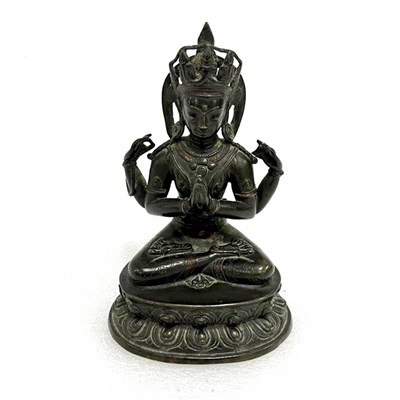 Lot 100 - A cast bronze figure of Shadakshari Lokeshvara