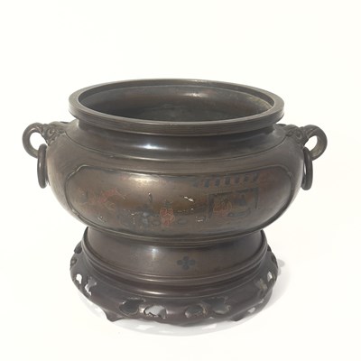 Lot 82 - A cast bronze silver and copper-inlaid censer and stand