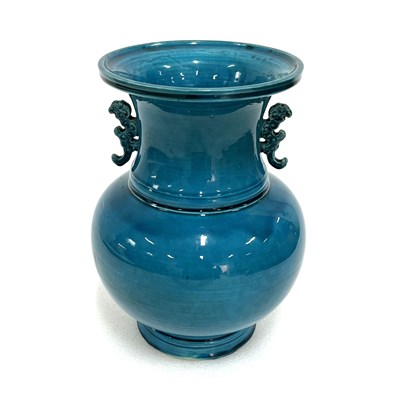 Lot 135 - A turquoise-glaze twin-handle vase