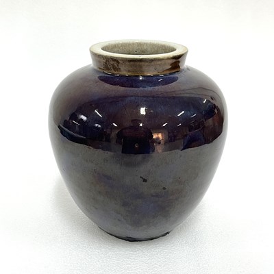 Lot 156 - A monochrome glazed porcelain jar