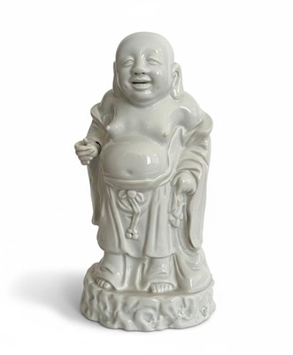 Lot 114 - A Chinese porcelain Blanc-de-Chine, Dehua, figure of Budai, Laughing Buddha