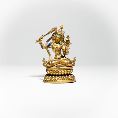 Lot 116 - A bronze figure of Manjushri, the Bodhisattva of Wisdom in Mahayana Buddhism
