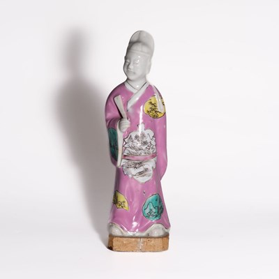 Lot 103 - A 'Famille Rose' Porcelain Figure