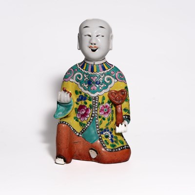 Lot 107 - A 'Famille Rose' Porcelain Figure of a Kneeling Boy