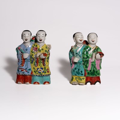 Lot 106 - A Rare Pair of 'Famille Rose' Figures of the He-He Er Xian